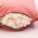 Cottoned throw pillow with velvet cover and organic cotton filling - filling detail