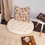 Cottoned-round-tufted-floor-cushion-with-organic-cotton-filling-in-setting