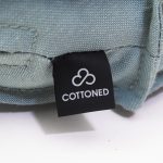 Cottoned bay window trapezoid cushion - blue cover tag detail