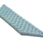 Cottoned tufted trapezoid cushion