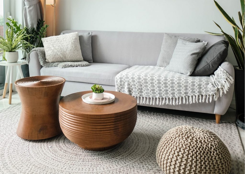 round coffee tables and round ottoman in living room